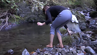 American Coed Braves Freezing River In Winter, Shivering At 60fps