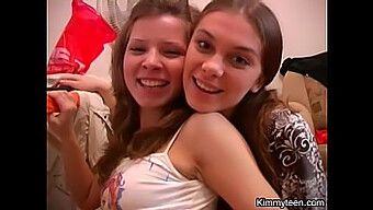 Hai Phụ Nữ Trẻ Tham Gia Vào Hành Vi Lesbian Gợi Cảm, Cởi Quần Áo Và Để Lộ Ngực Của Họ.