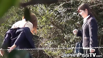 Japanese Teens Engage In Outdoor Peeing And Sensual Embrace