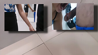 A Petite Asian Saleswoman Gives A Customer An Unforgettable Oral Experience In A Mall Dressing Room.